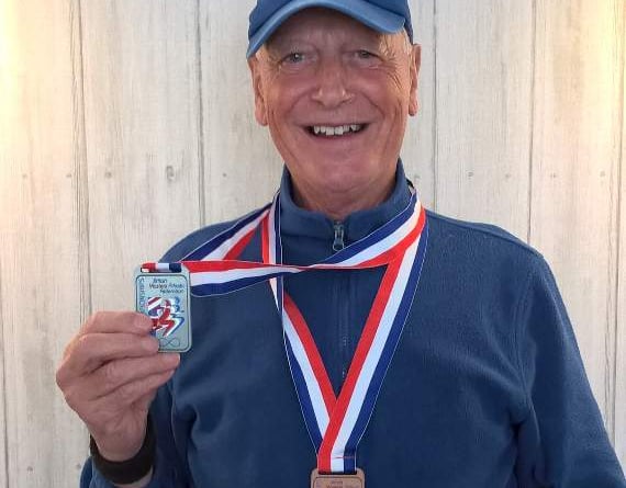 Town crier turns the clock back 60 years at British Masters Athletic ...