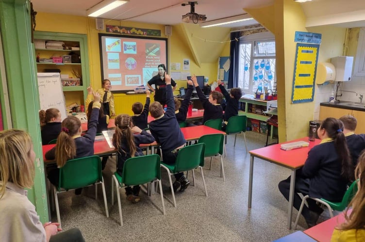 Pupils at St. Teilos School, Tenby with Fair Trade Football Campaign Founder Sharron Hardwick