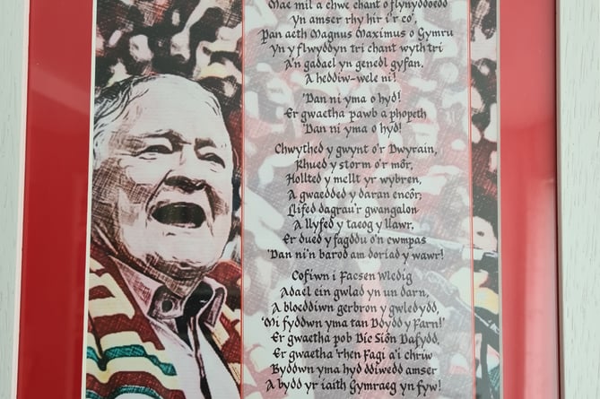 Framed poster of the words of Yma o Hyd 