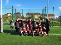 Odd socks and a hard fought victory from Tenby Under 15s