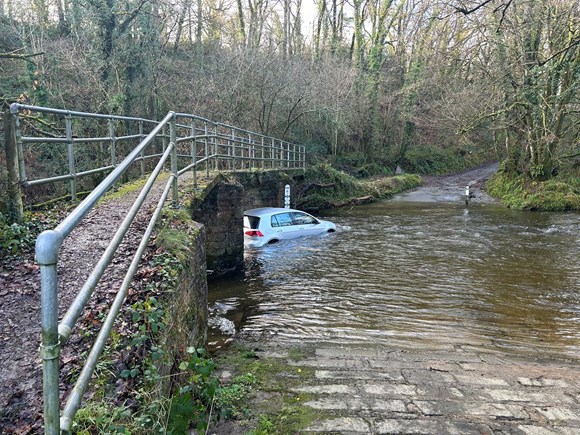 Car stuck in ford