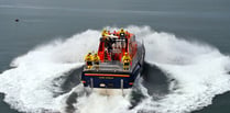 Tenby RNLI rescue teenage paddleboarder being blown out to sea