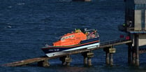 Tenby RNLI crew hot-foot it over to Pendine to help injured person