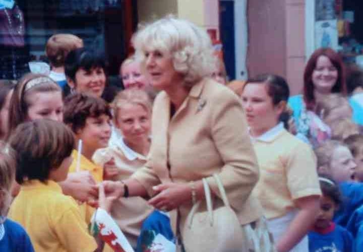 Queen Camilla - as she is now known - amid children in Tenby’s Tudor Square