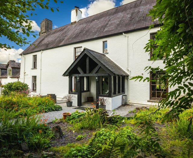 "Impressive" farmhouse for sale comes with riverside woodlands 