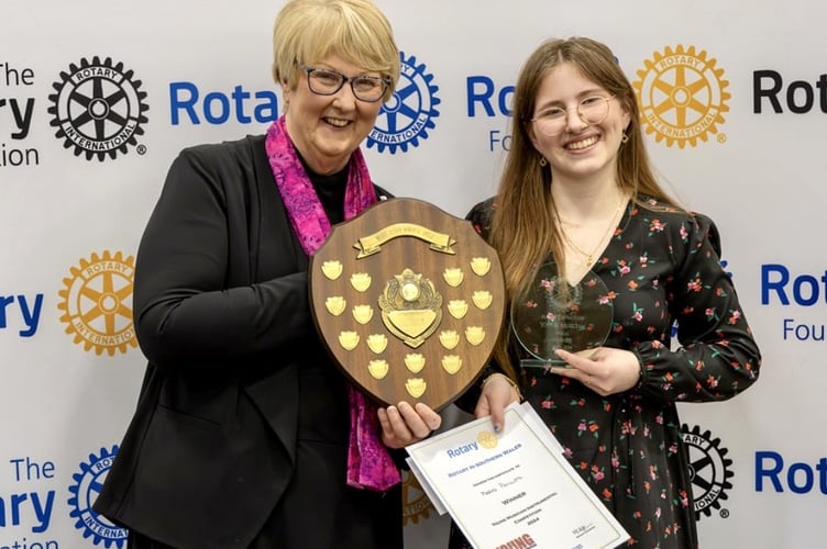 District Governor of Rotary in Southern Wales Mary Adams presenting Mared with her prize