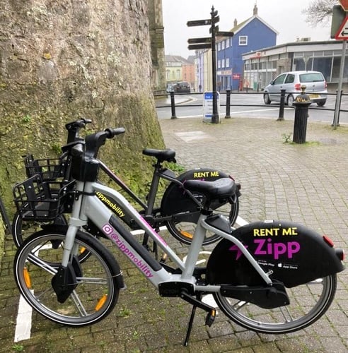 Ebikes by Tenby town walls