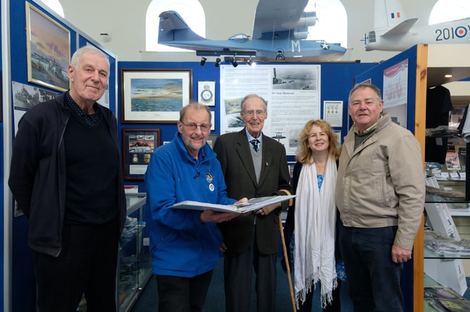 Hugh Langrishe was welcomed by Pembroke Dock Heritage Centre Patron John Evans. With them are, left to right: Cliff Morris, Julie Cavanagh and Jack Langrishe. (Photo: Martin Cavaney Photography)