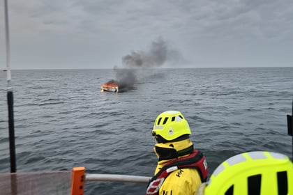 Tenby RNLI pull casualty from water after yacht goes up in flames