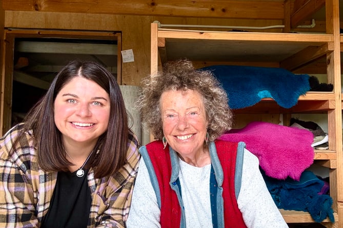 Susie Lincoln (right) is “thrilled and excited” to be handing Susie’s Sheepskin Boots over to Bethan Thomas (left).