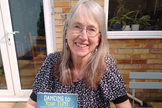 Sheila Hopkins with her new book, Dancing to Your Tune