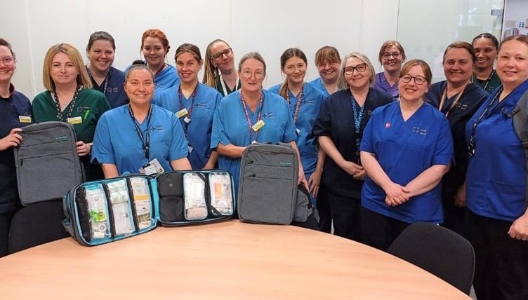 Members of the community nurse team with the new bags.