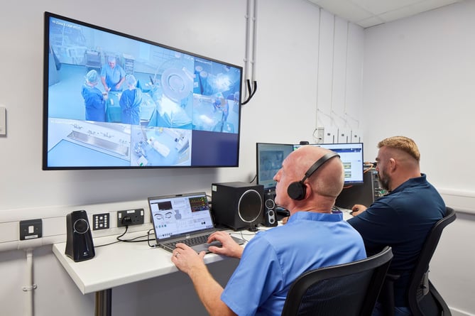 Simulation technologists controlling a scenario at SUSIM, Swansea University