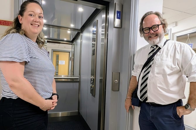 Chairman Ian Gravell and Manager Lara Herde with new lift at Narberth's Queens Hall