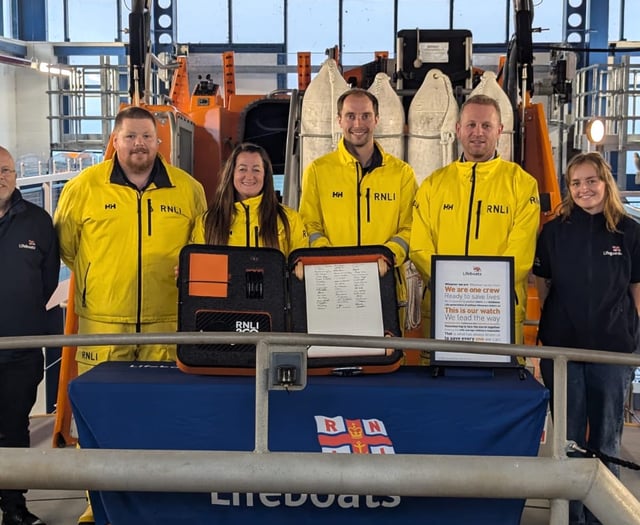 Scroll signing at Tenby station marks RNLI's 200th anniversary