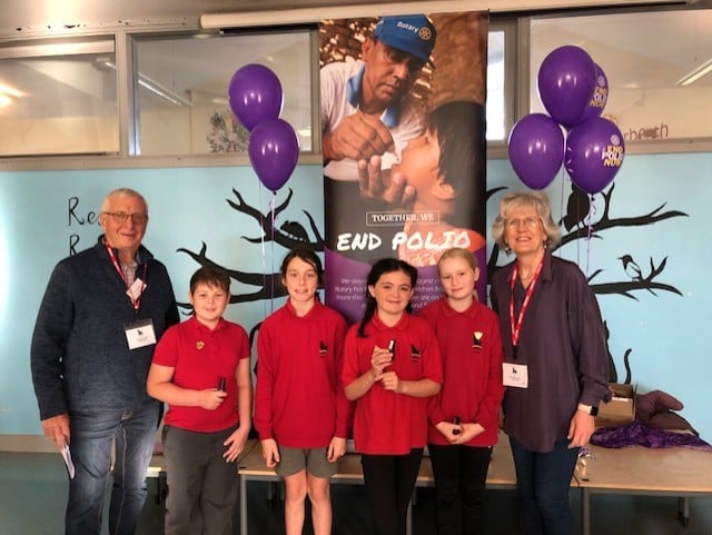 Rotarians Nigel Towns and Elaine Bradbury with children at Narberth CP School