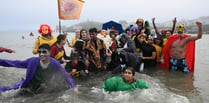 WATCH: 1,150 dippers enjoy record-breaking Tenby Boxing Day Swim