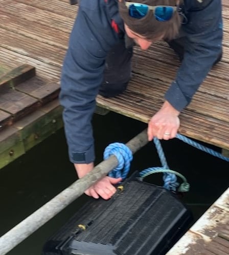 Underneath the pontoon at Rudders Boatyard the Deputy First Minister saw the oyster cages - where oysters are kept as broodstock to release larvae into the Haven to boost the existing population.